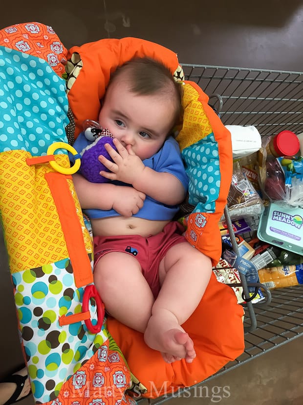 A little girl sitting in a chair