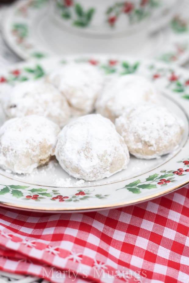 A close up of food on a plate, with Cookie and Russian tea cake