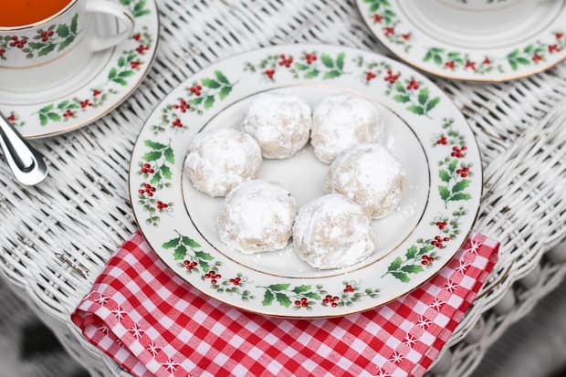 A plate of food on a table, with Cookie and Powdered sugar