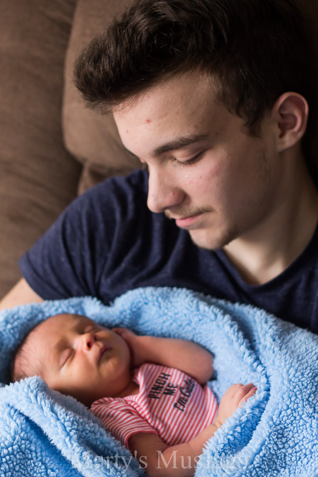 A man holding a baby