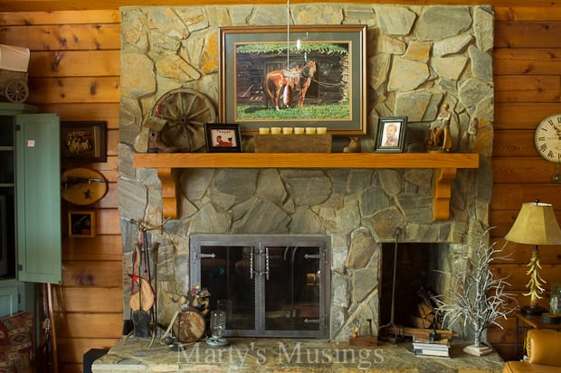 A fire place sitting in a living room with a fireplace