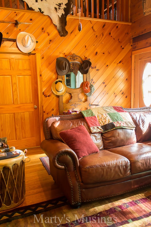 A living room filled with furniture and a tv