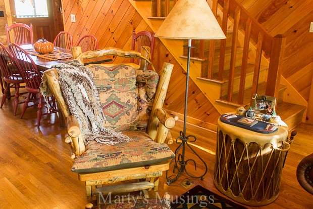 A living room filled with furniture and a fireplace