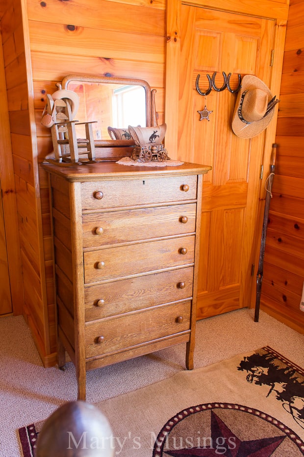 A bedroom with a wooden floor