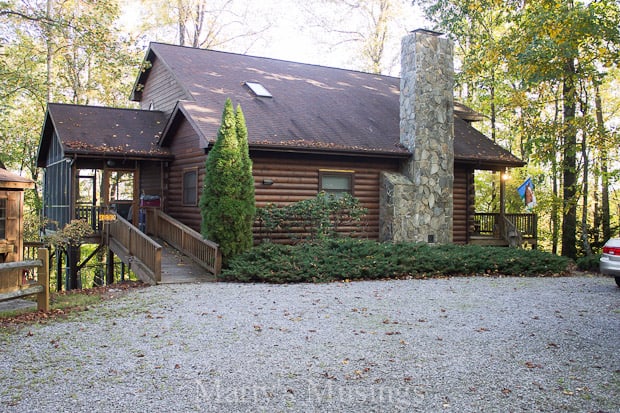 A house with trees in the background