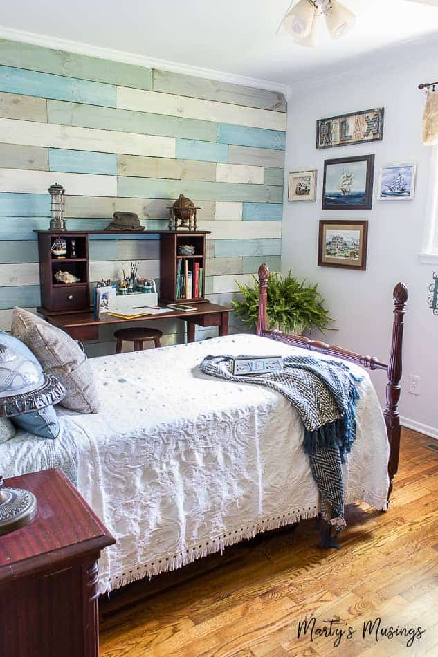 chalk painted shiplap wall in coastal theme bedroom