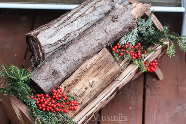 A close up of a flower pot sitting on top of a wooden door