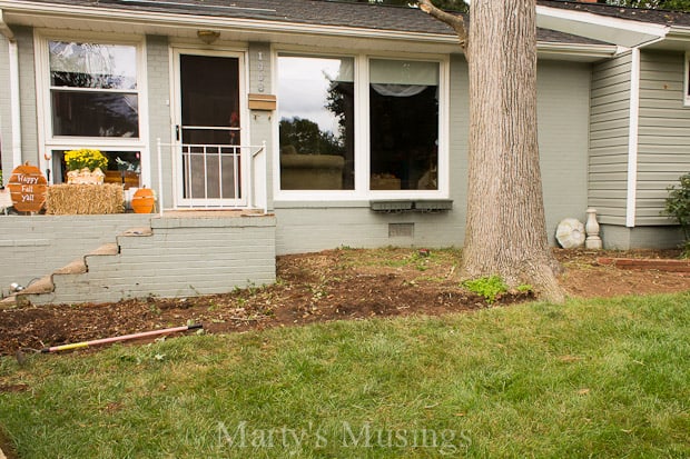 A bench in front of a house