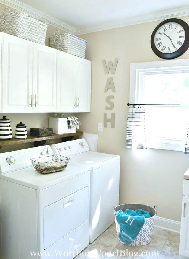 Amazing laundry room makeover by Worthing Court blog with rustic and farmhouse touches and organizational tips and inspiration.