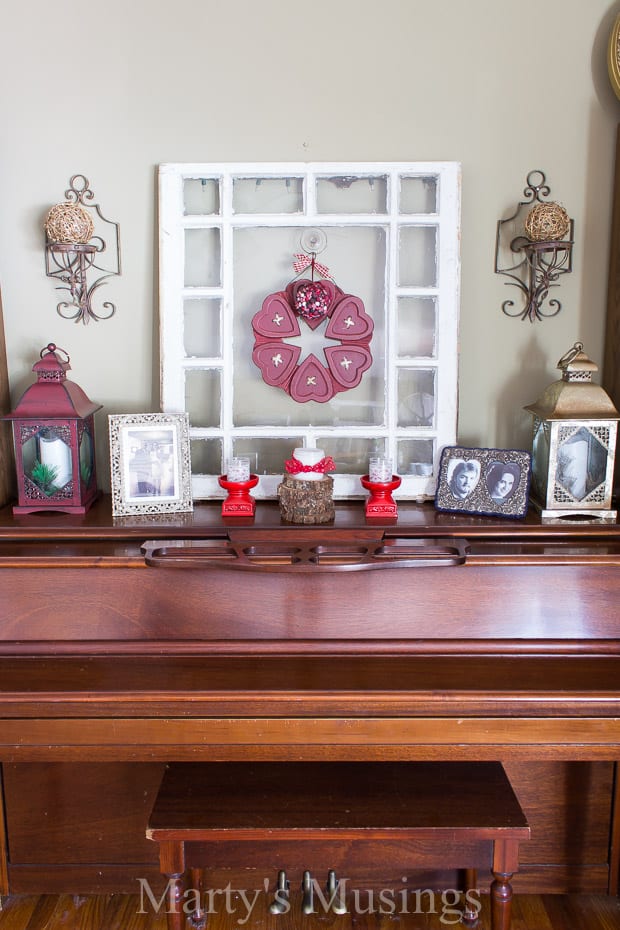 A vase of flowers sitting on top of a wooden table