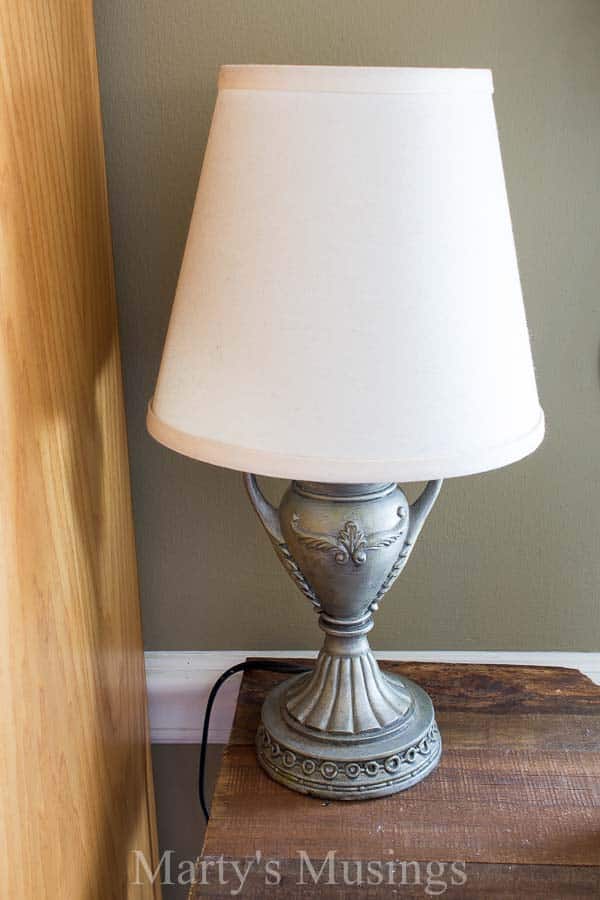 A lamp that is sitting on a table