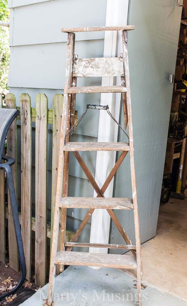 A chair sitting in front of a house