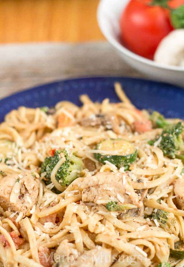 A bowl of food with broccoli, with Pasta primavera