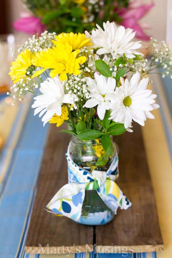 A bouquet of flowers in a vase on a table