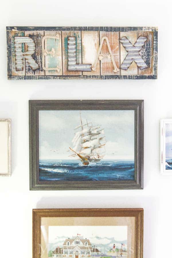 See how one DIY blogger used one rustic, repurposed wood art with coastal colors inspiration for an amazing makeover of her teenaged son's room.