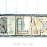 See how one DIY blogger used one rustic, repurposed wood art with coastal colors inspiration for an amazing makeover of her teenaged son's room.