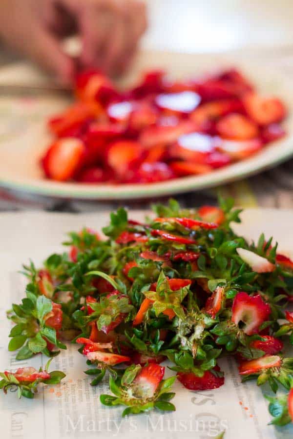 A plate of food on a table, with Strawberry and Pie