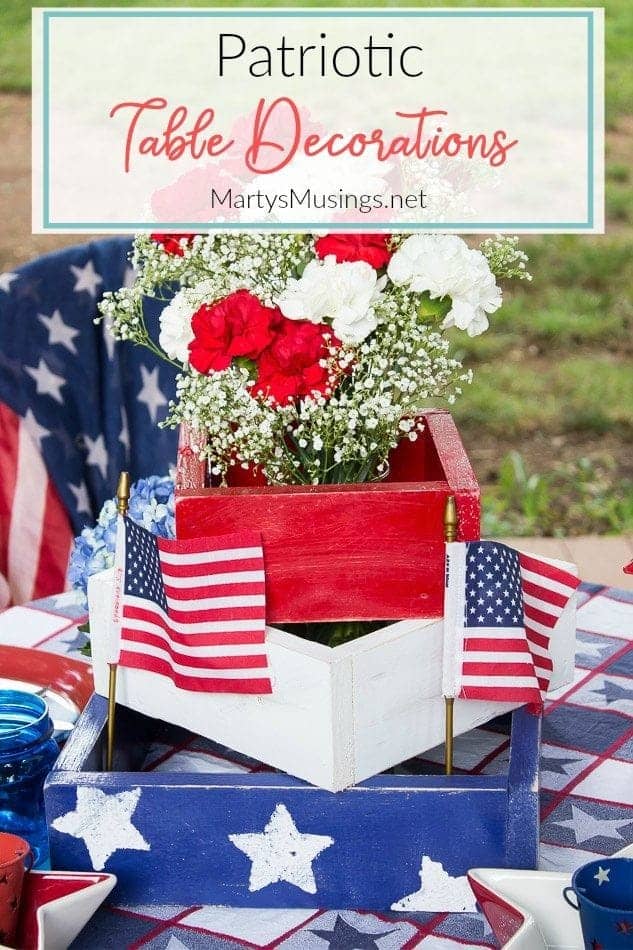 Red, white and blue box with red and white carnations for 4th of July