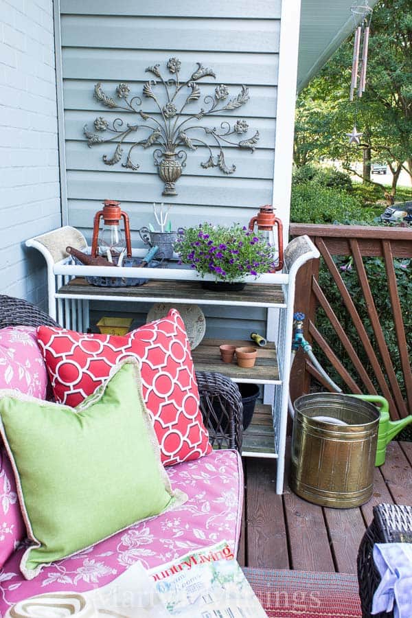 Colorful throw pillows on outside front deck