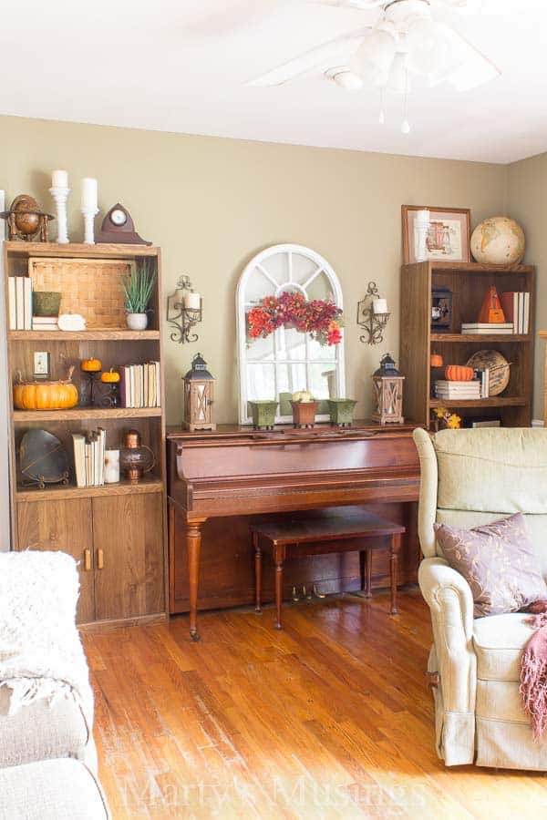 pumpkins and fall decor in living room