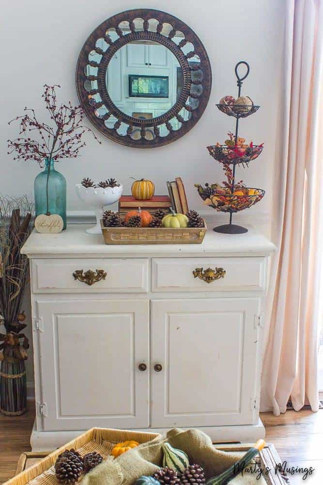 fall vignette on top of white chalk painted chest