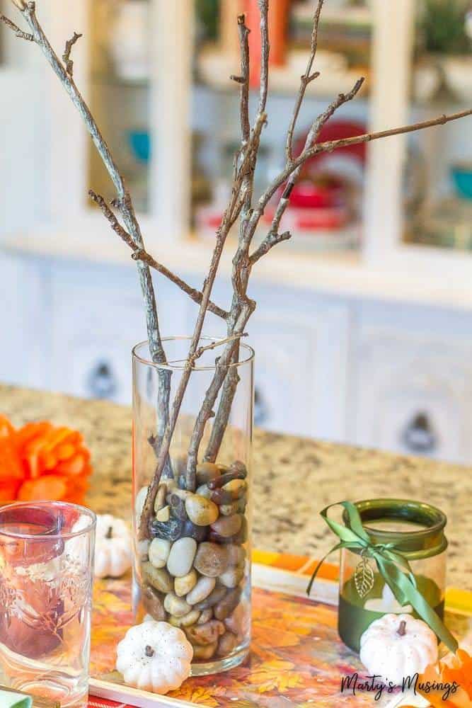 A vase filled with flowers sitting on a table