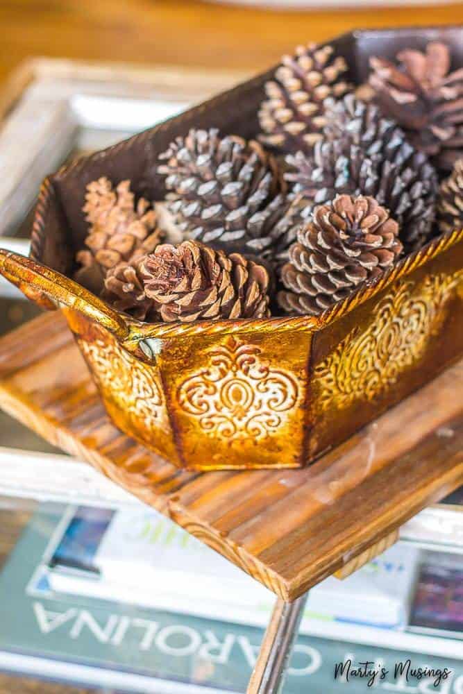 pine cones in copper basket