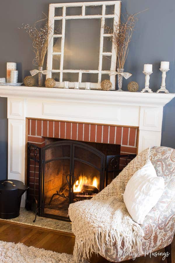 A living room filled with furniture and a fireplace