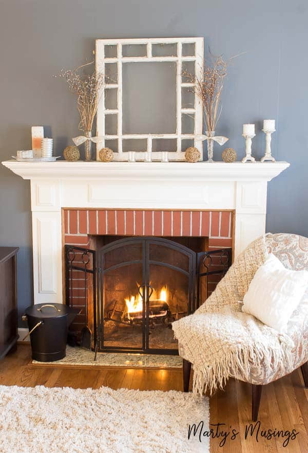 A living room filled with furniture and a fire place