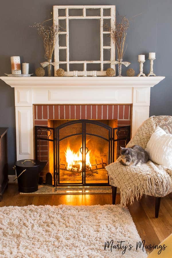 A living room filled with furniture and a fireplace