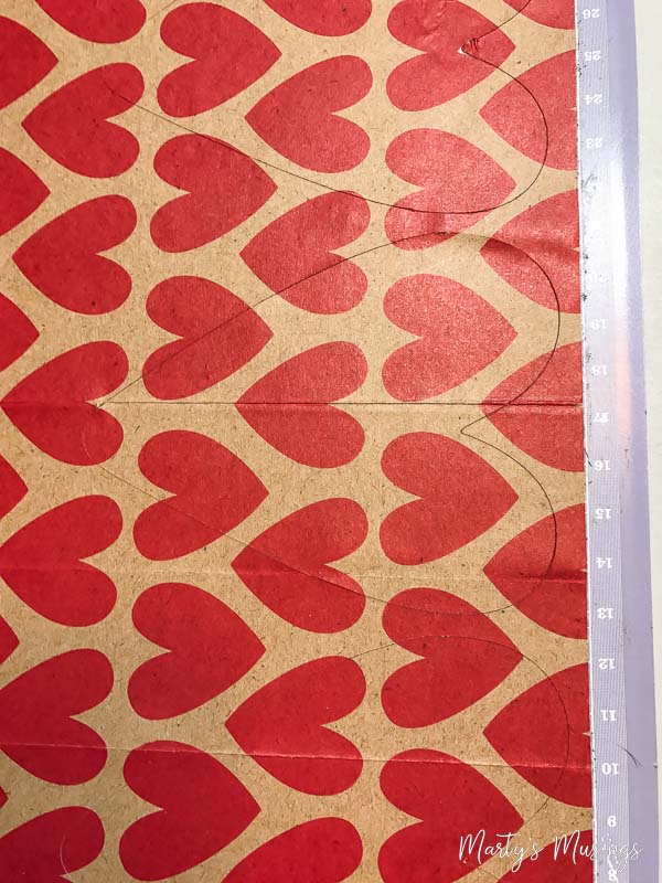 Red hearts on brown background paper