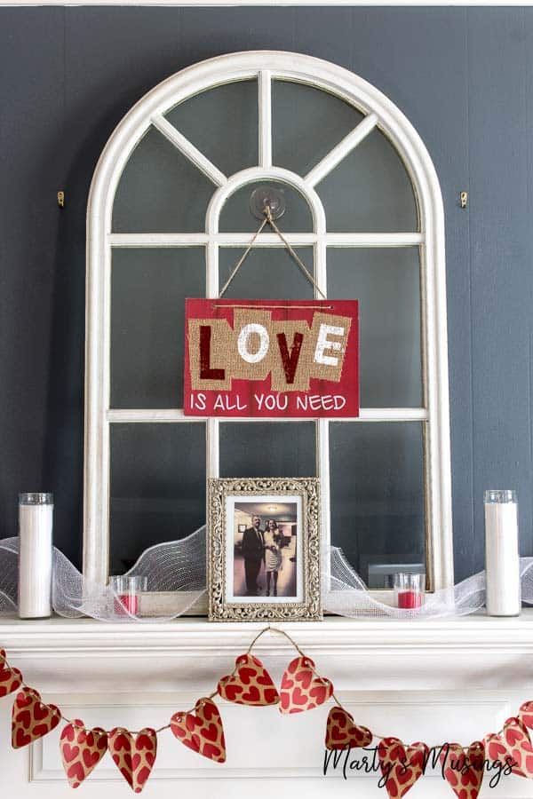 Mantel with cathedral window and banner attached