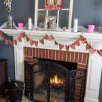 A fireplace in a living room filled with furniture and a fire place