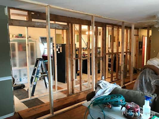 A room filled with furniture and a large window