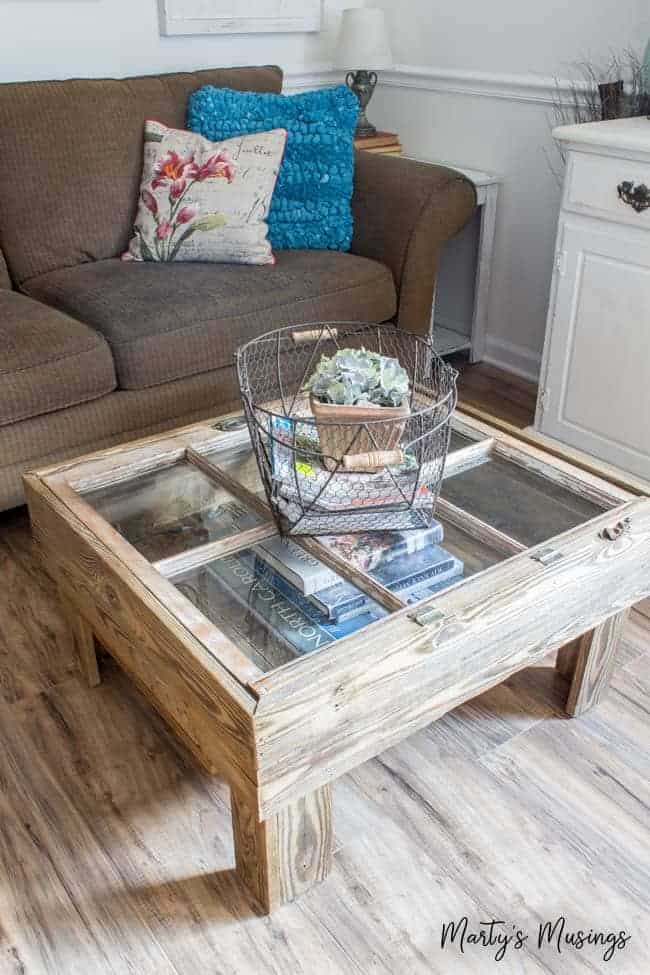 A living room filled with furniture and a fireplace