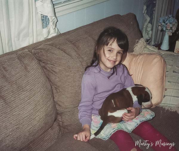 A little girl lying on a bed