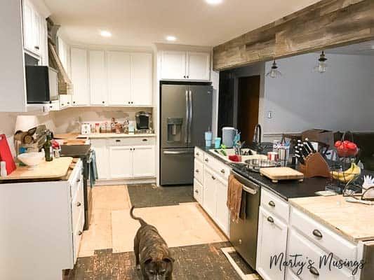 Unfinished remodeled kitchen with a mess on countertops