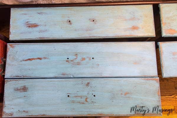 Blue distressed wooden drawer fronts
