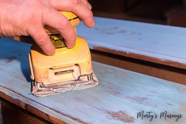 Distressing painted wooden drawers