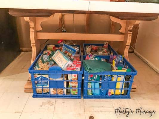 Food storage in crates stored under table