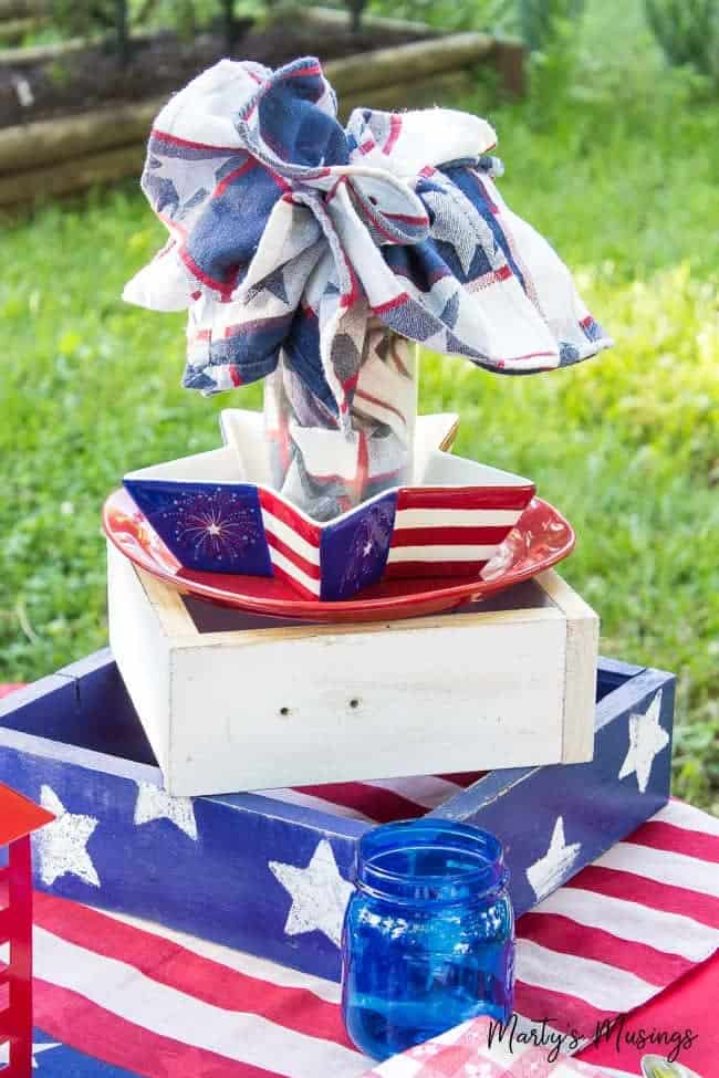 A cake sitting on top of a picnic table