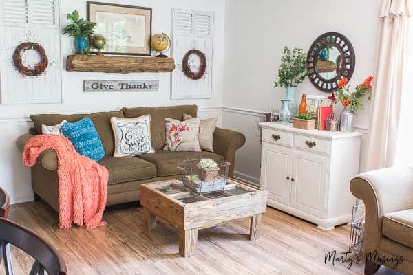 A living room filled with furniture and a fire place