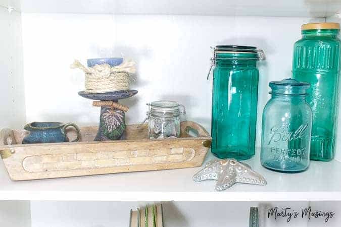 A bottle of items on the counter