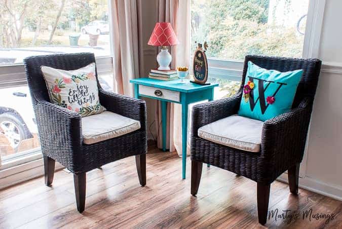 A living room filled with furniture and a large window