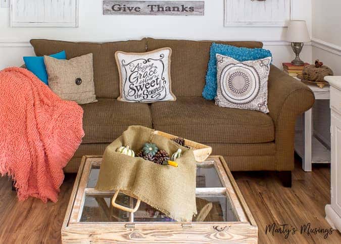 A living room filled with furniture and a fire place