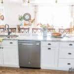 A stove top oven sitting inside of a kitchen