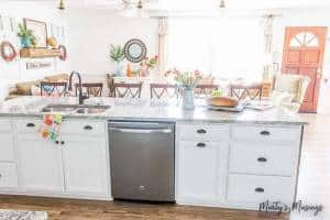 A stove top oven sitting inside of a kitchen