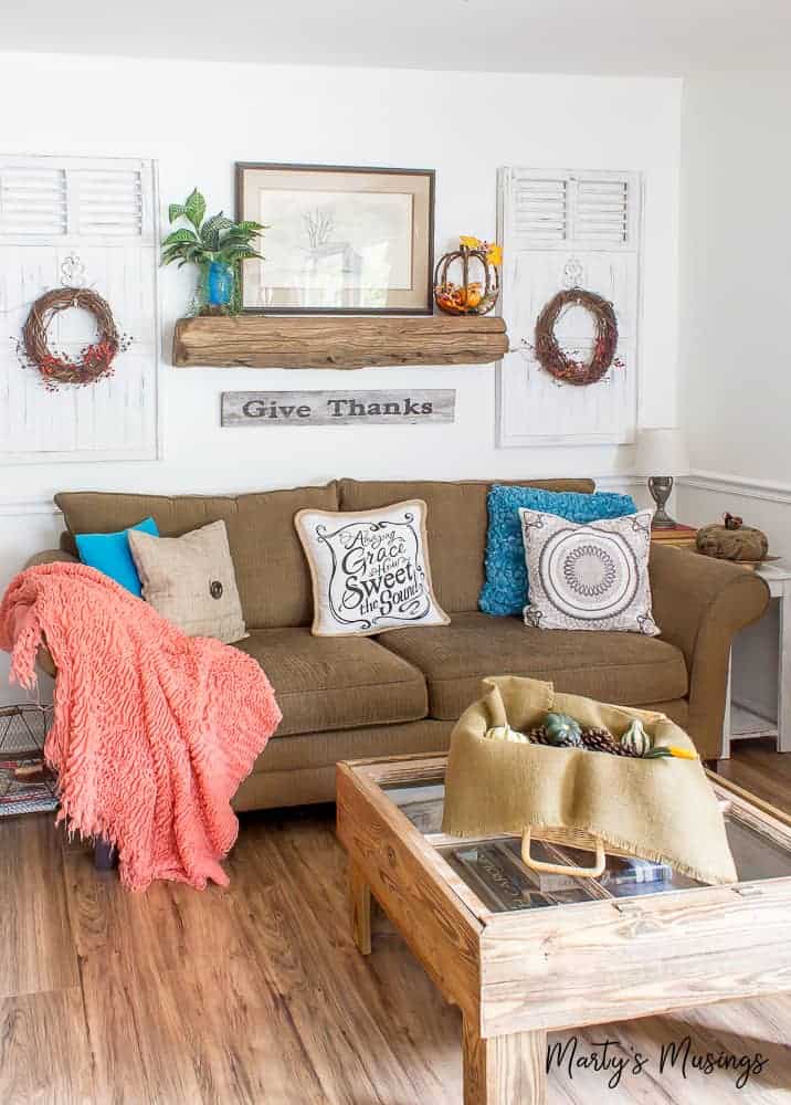 A living room filled with furniture and a fire place