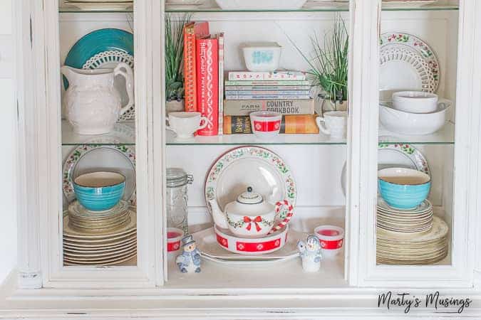 This rustic Christmas kitchen decor is simple to pull together using aqua and red accents for a pop of color and easy, thrifted accessories!