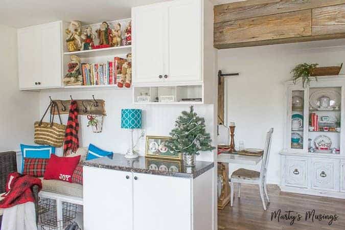 A kitchen with a sink and a refrigerator